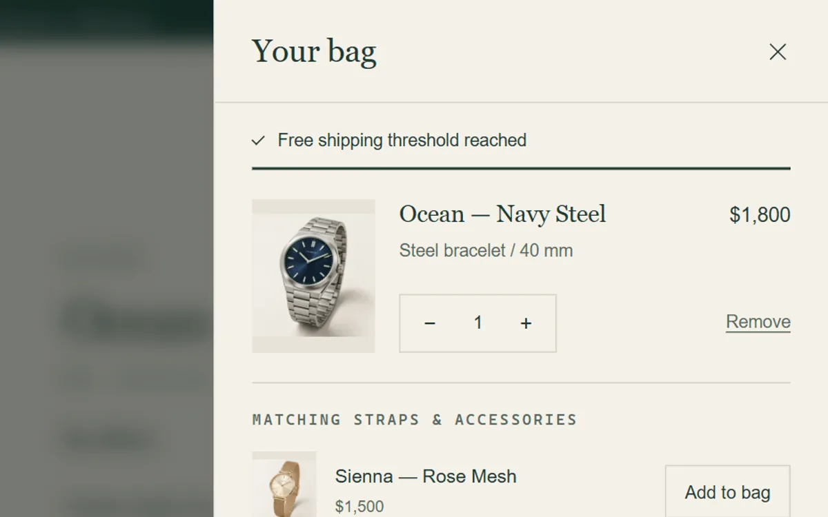 Cart drawer with a free shipping progress line above the added watch.